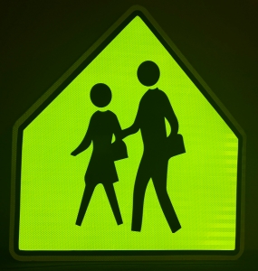 Fluorescent yellow-green signs