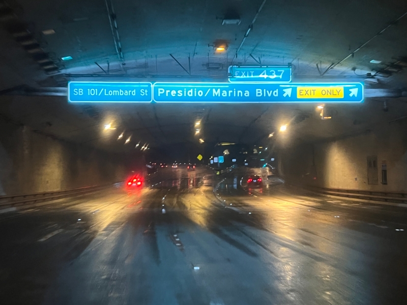 Large illuminated signs appear in the Presidio Tunnel, Golden Gate Bridge